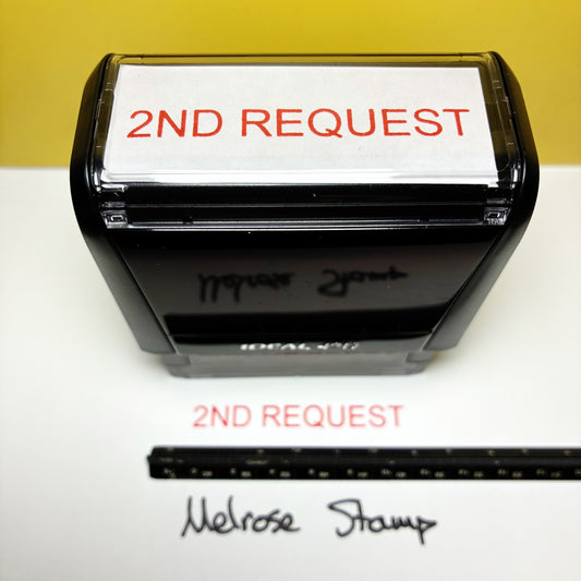 Rubber stamp with '2ND REQUEST' text on a white background