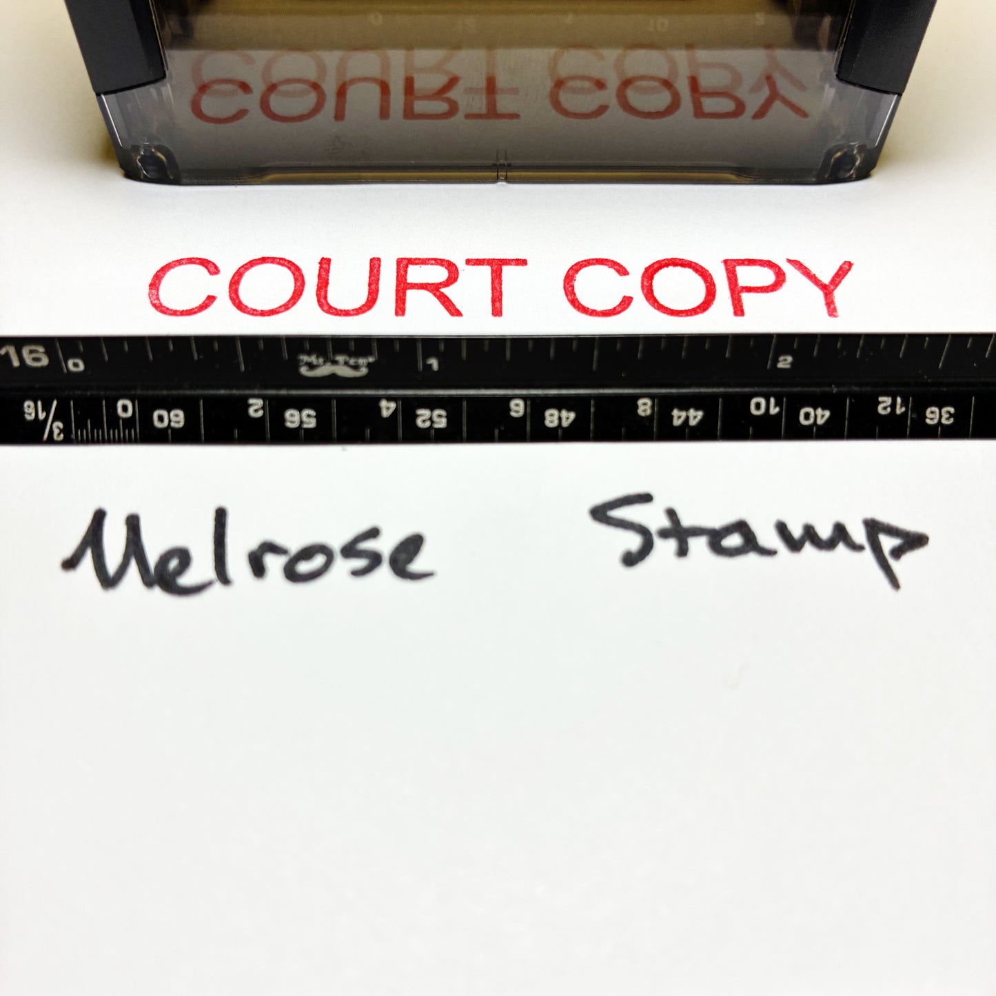 Rubber stamp with 'COURT COPY' text and a ruler below, on a white background.