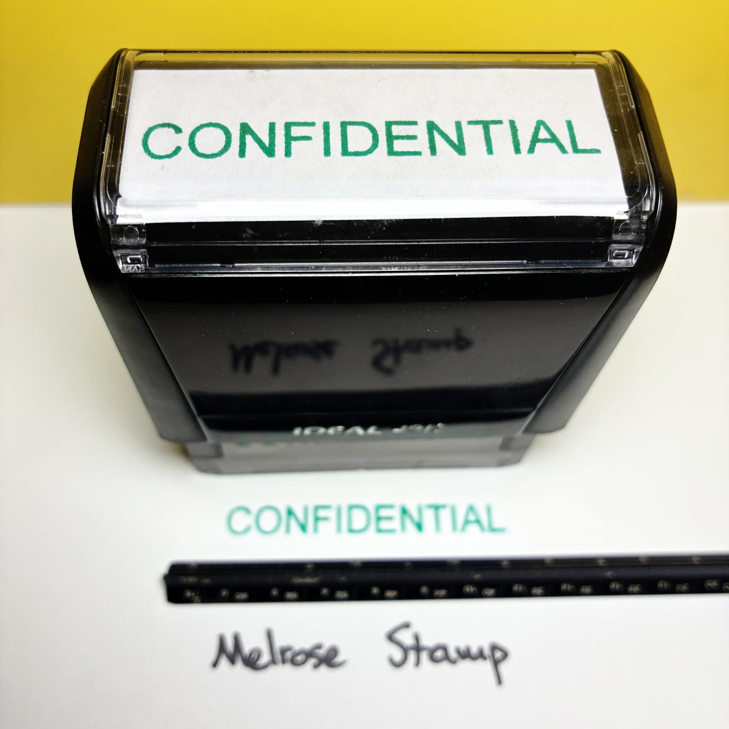 Confidential stamp with a yellow background