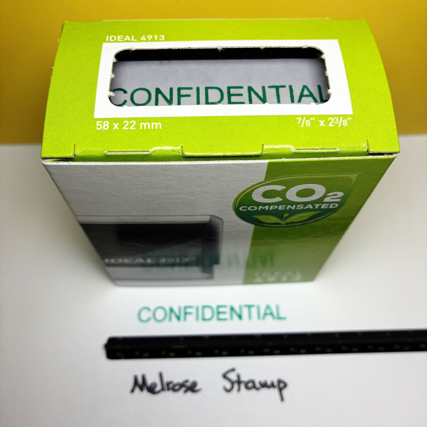 Green box 'Confidential' rubber stamp