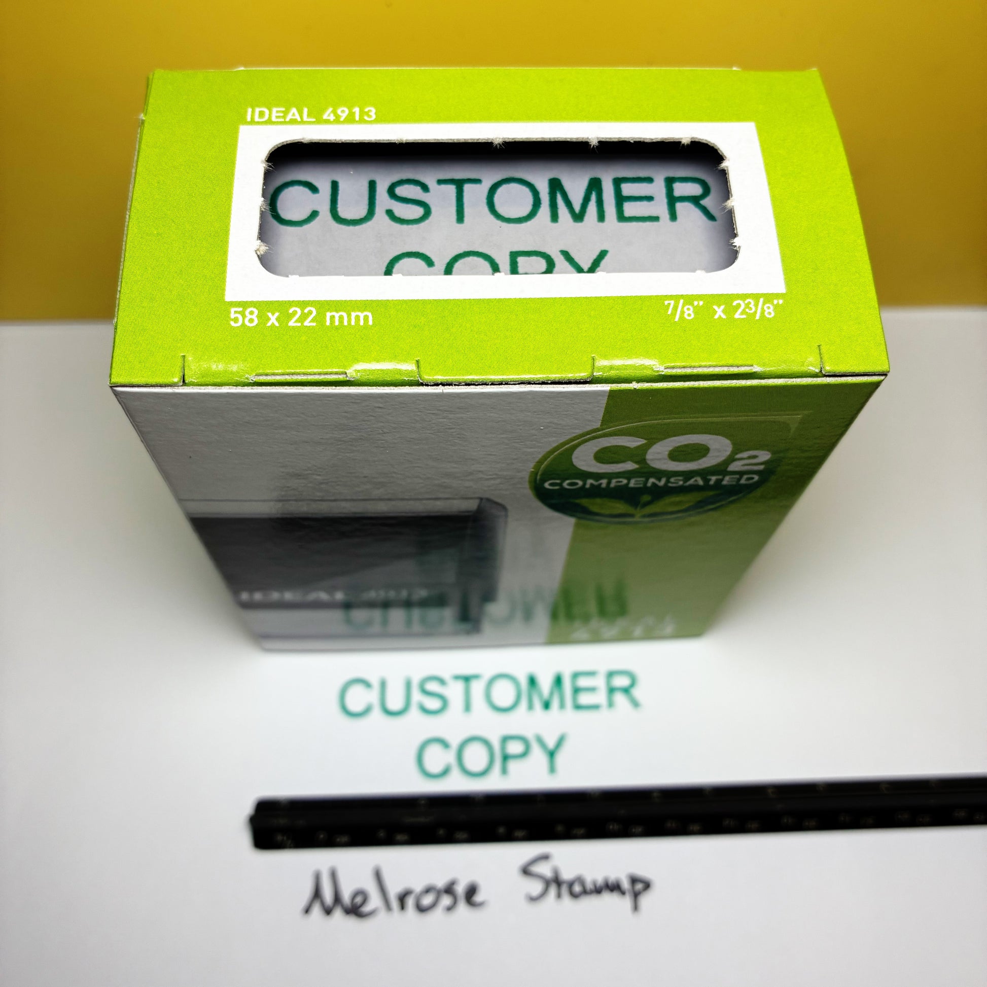Green box with 'Customer Copy' self-inking rubber stamp green ink