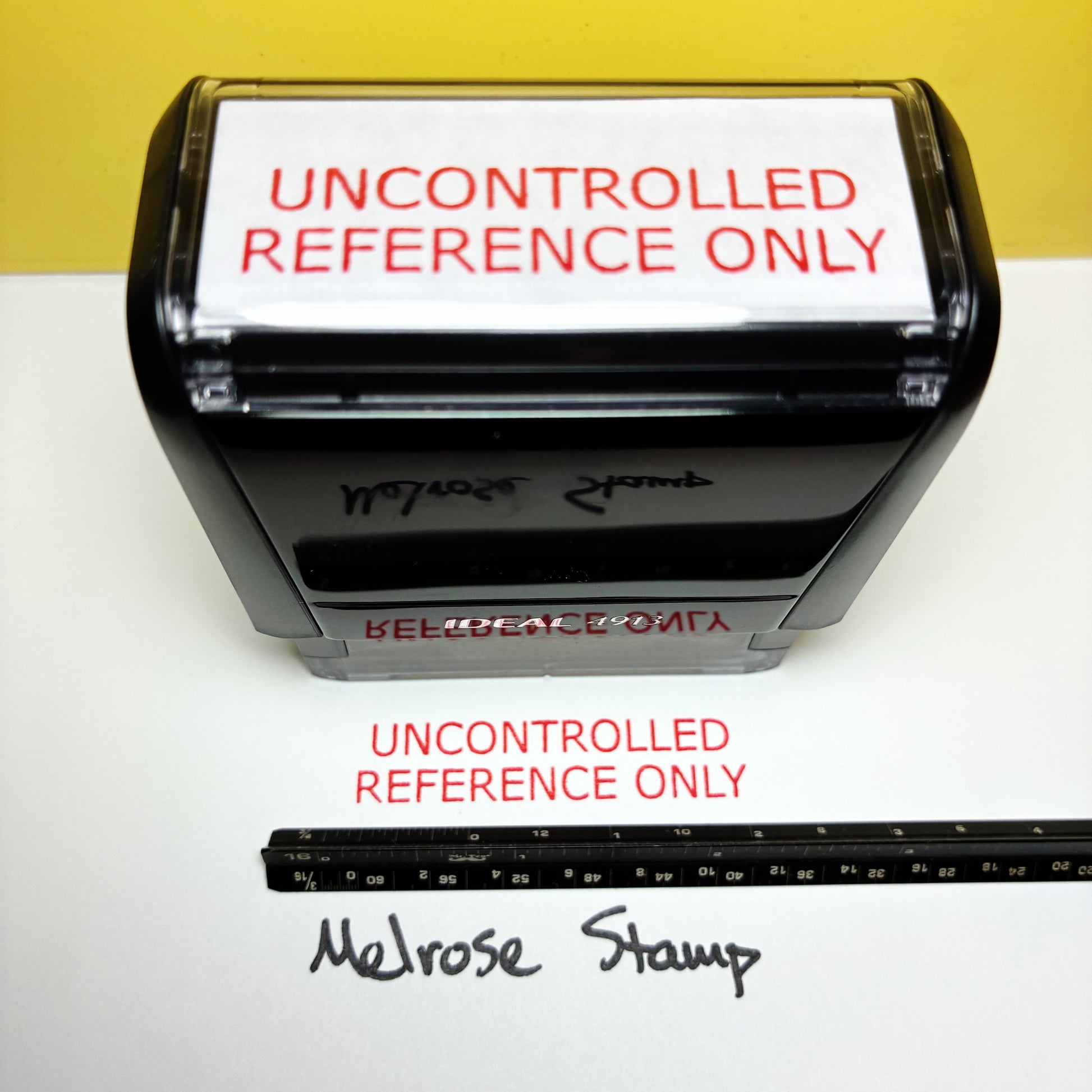 Rubber stamp with 'Uncontrolled Reference Only' text on a white background