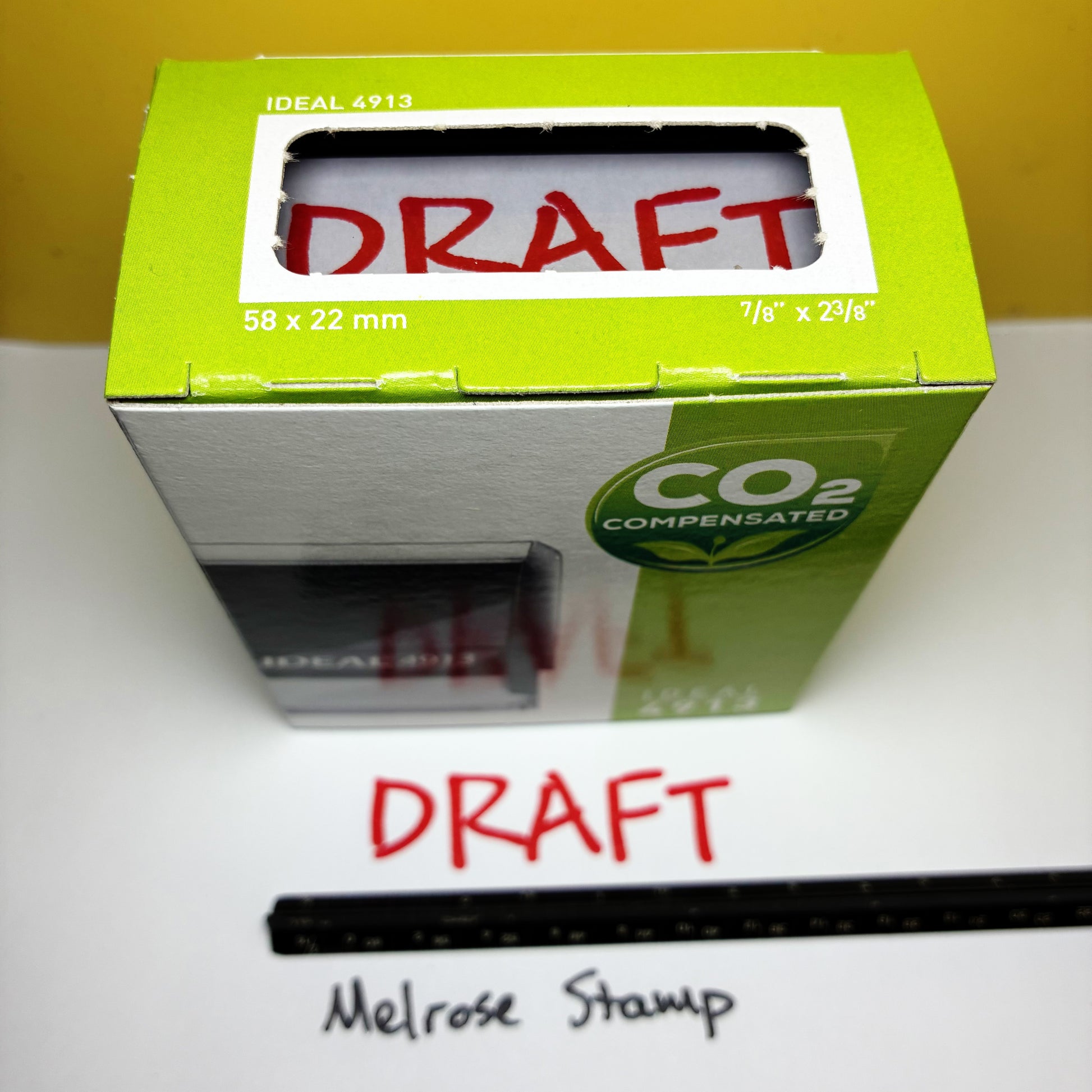 Green box with 'DRAFT' text on a rubber stamp red ink