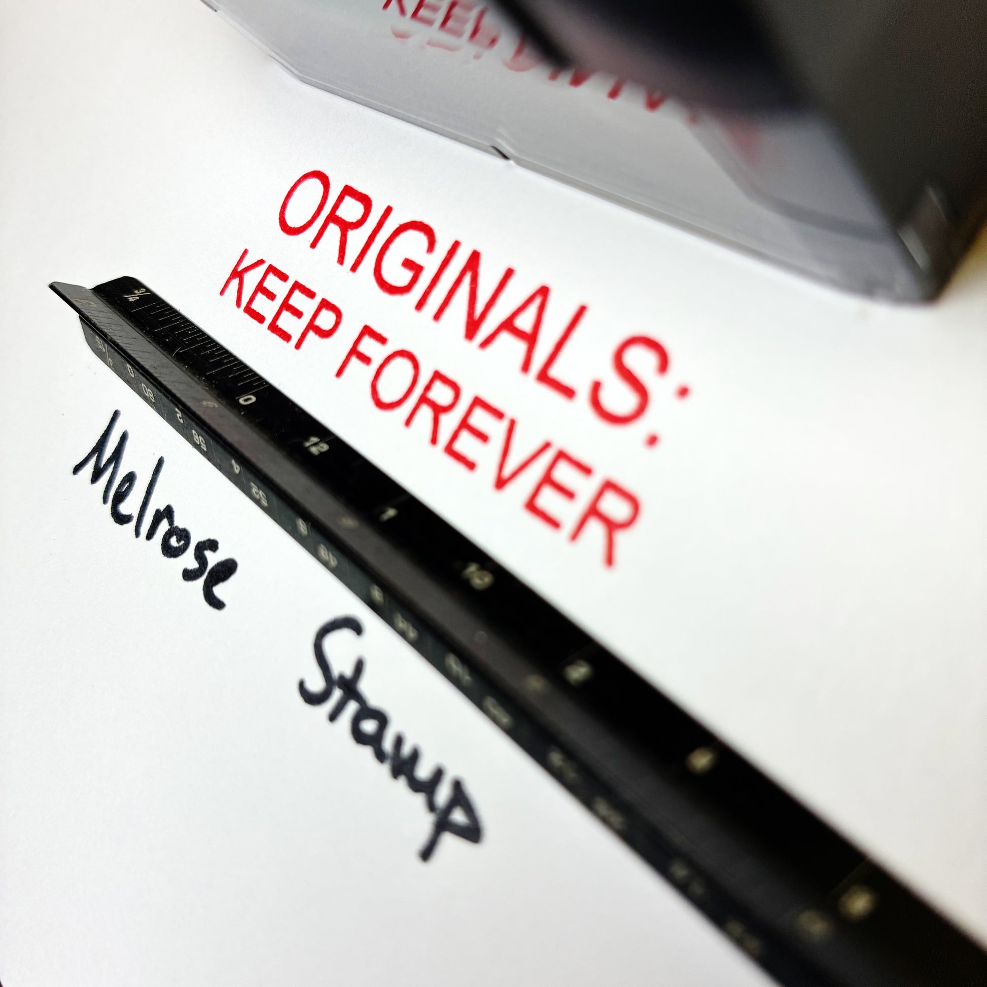 Black stamp with 'Melrose Stamp' and text 'Originals: Keep Forever' on a white background