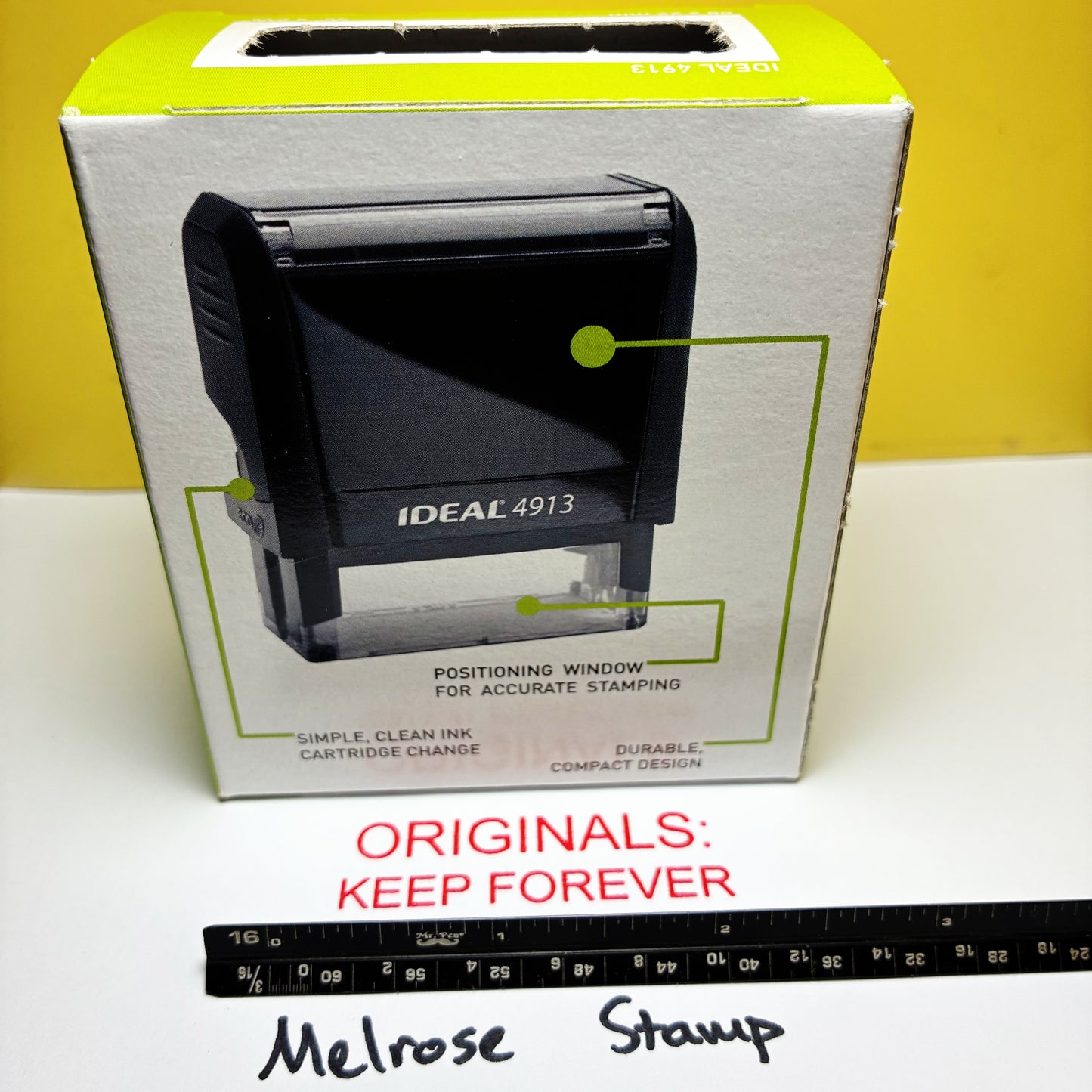 Originals Keep Forever stamp in the box with ruler.