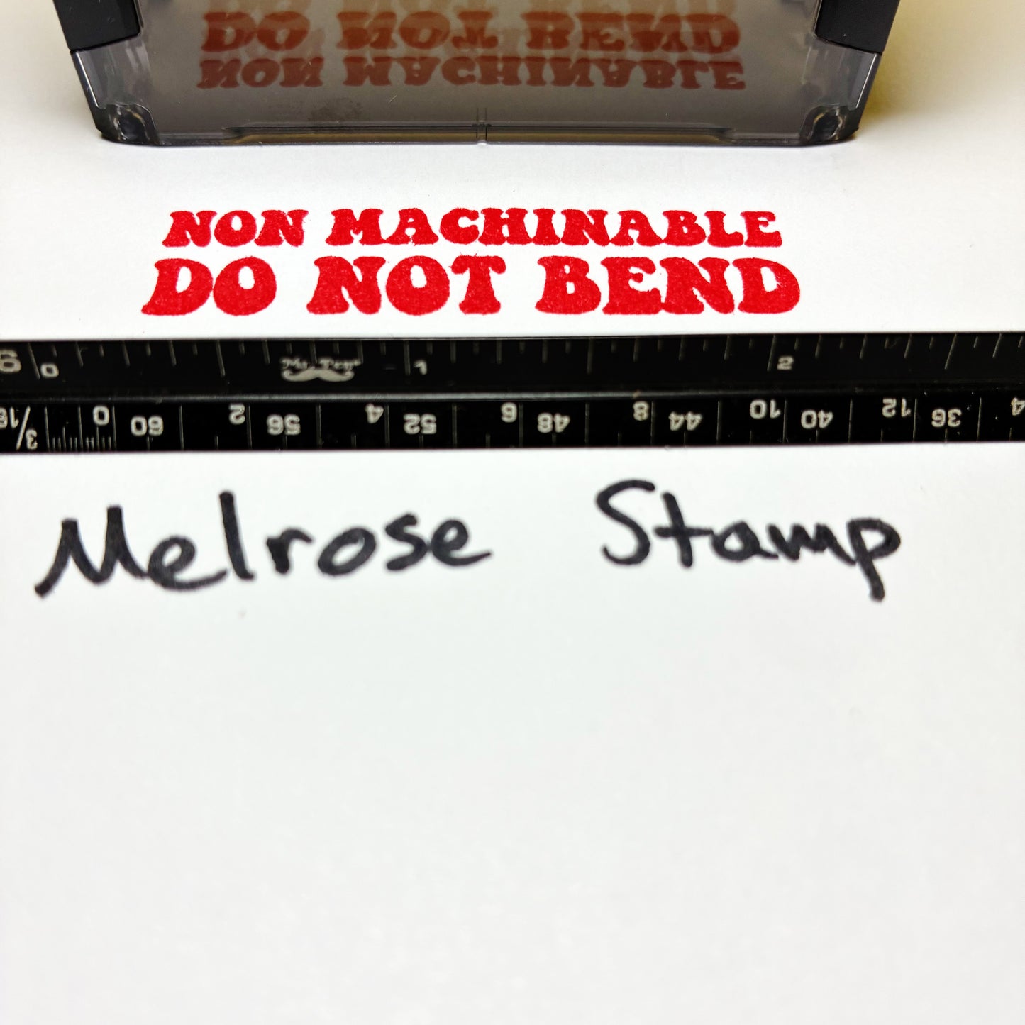 NonMachinable Do Not Bend rubber stamp red ink large