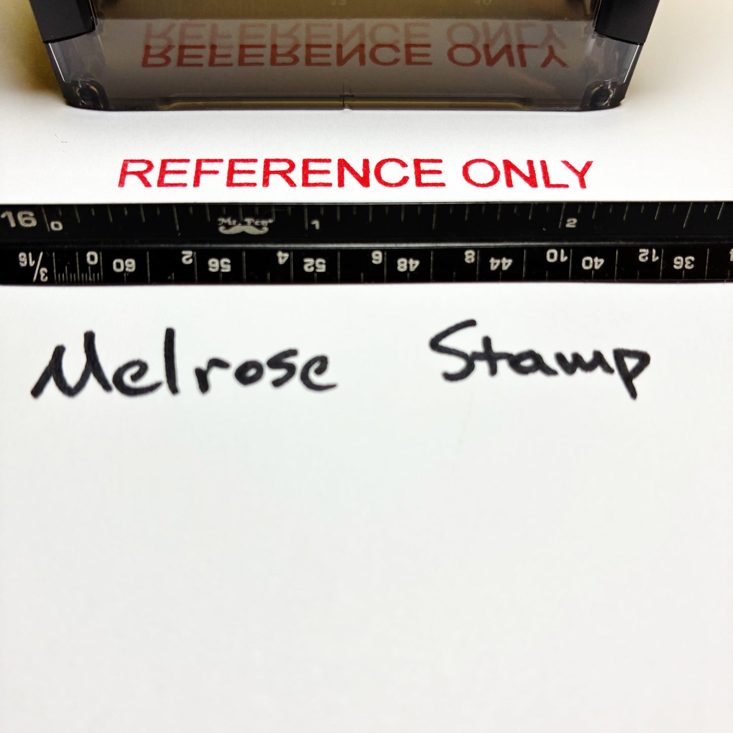 Stamp with 'REFERENCE ONLY' text and 'Melrose Stamp' branding on a white background
