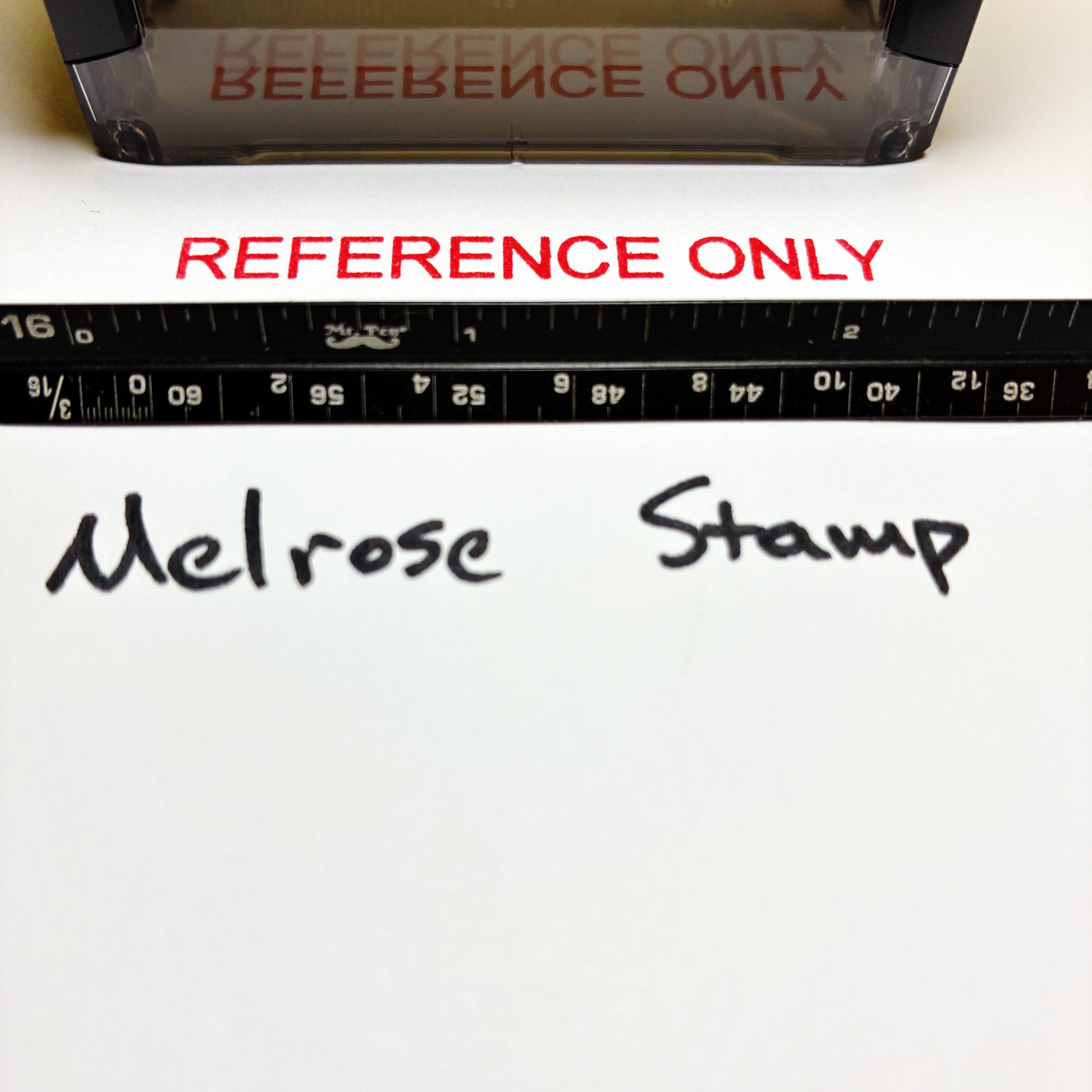 Stamp with 'REFERENCE ONLY' text and 'Melrose Stamp' branding on a white background