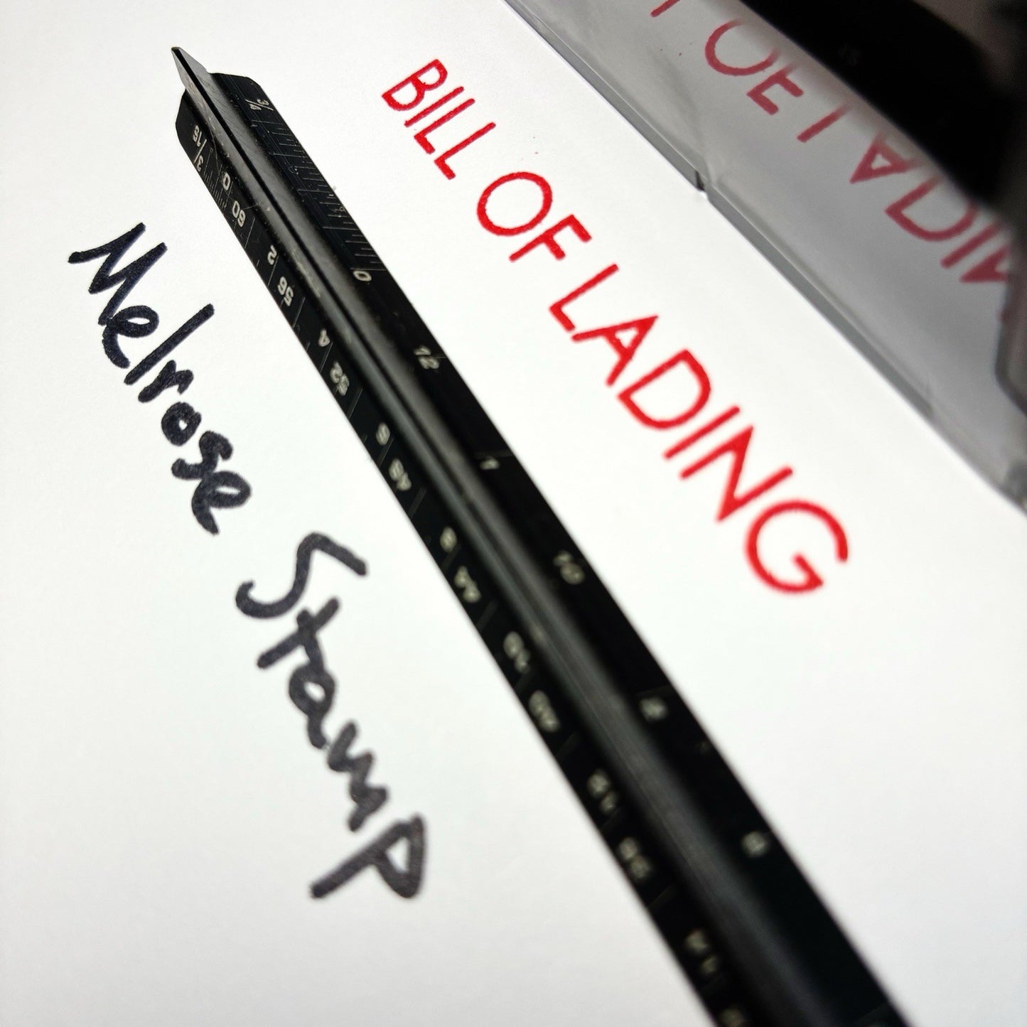 Rubber stamp with 'BILL OF LADING' text.
