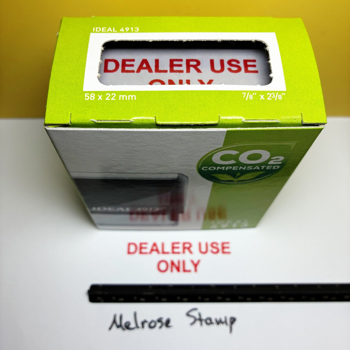 Green box with 'DEALER USE ONLY' text on a white surface