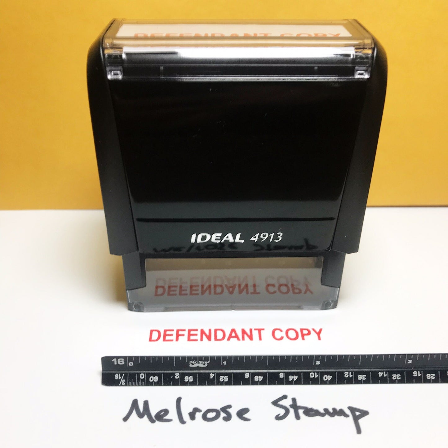 Defendant Copy stamp on a sheet of paper