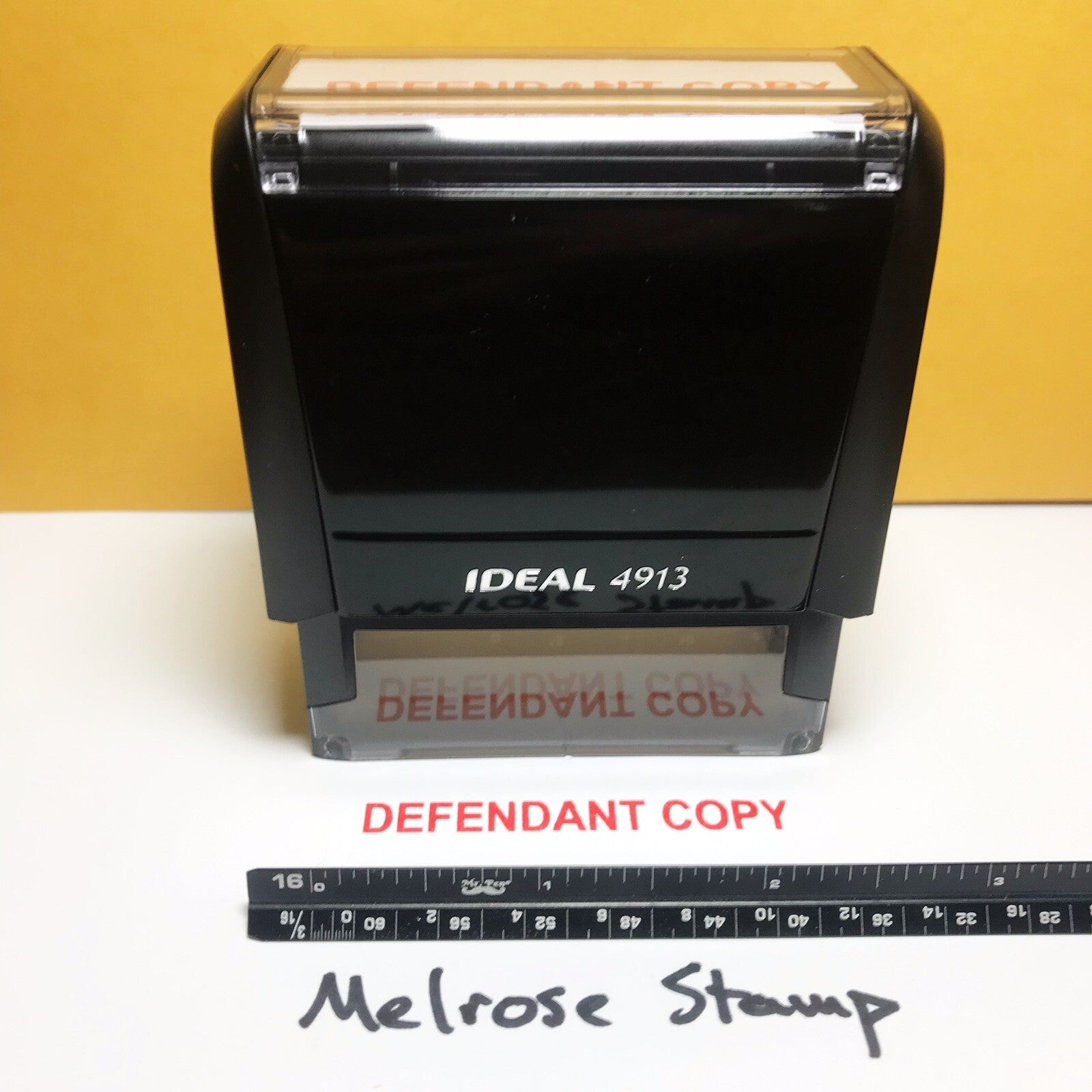 Defendant Copy stamp on a sheet of paper