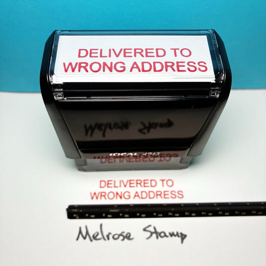 Stamp with 'Delivered to Wrong Address' text on a blue background