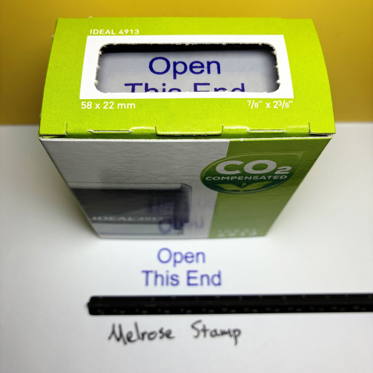 Green stamp box with Open This End stamper