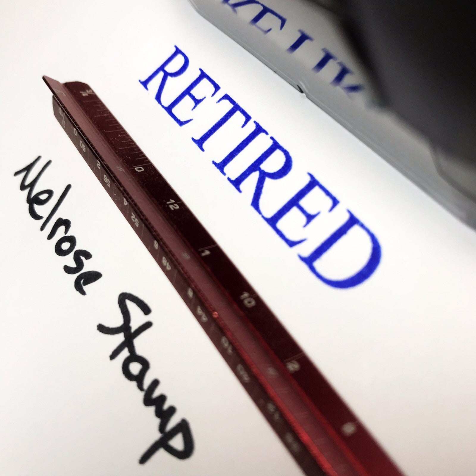 Reired stamp impression close up