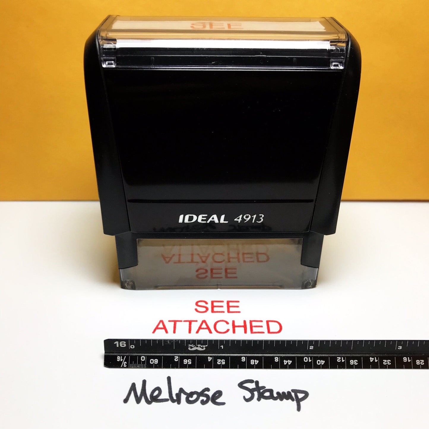 See Attached stamp red ink from the front