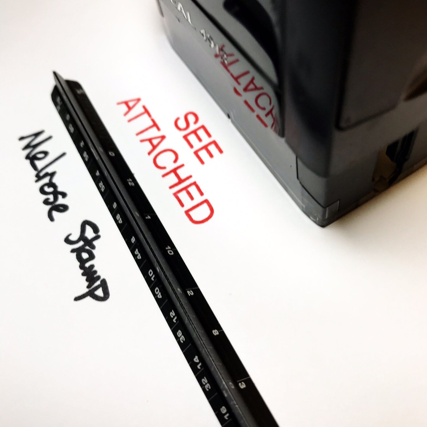 See Attached stamp impression close up