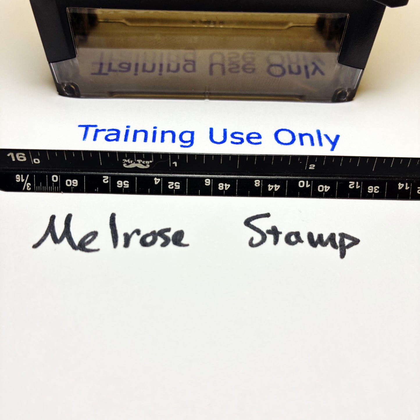 Rubber stamp with 'Training Use Only' text and a ruler below.