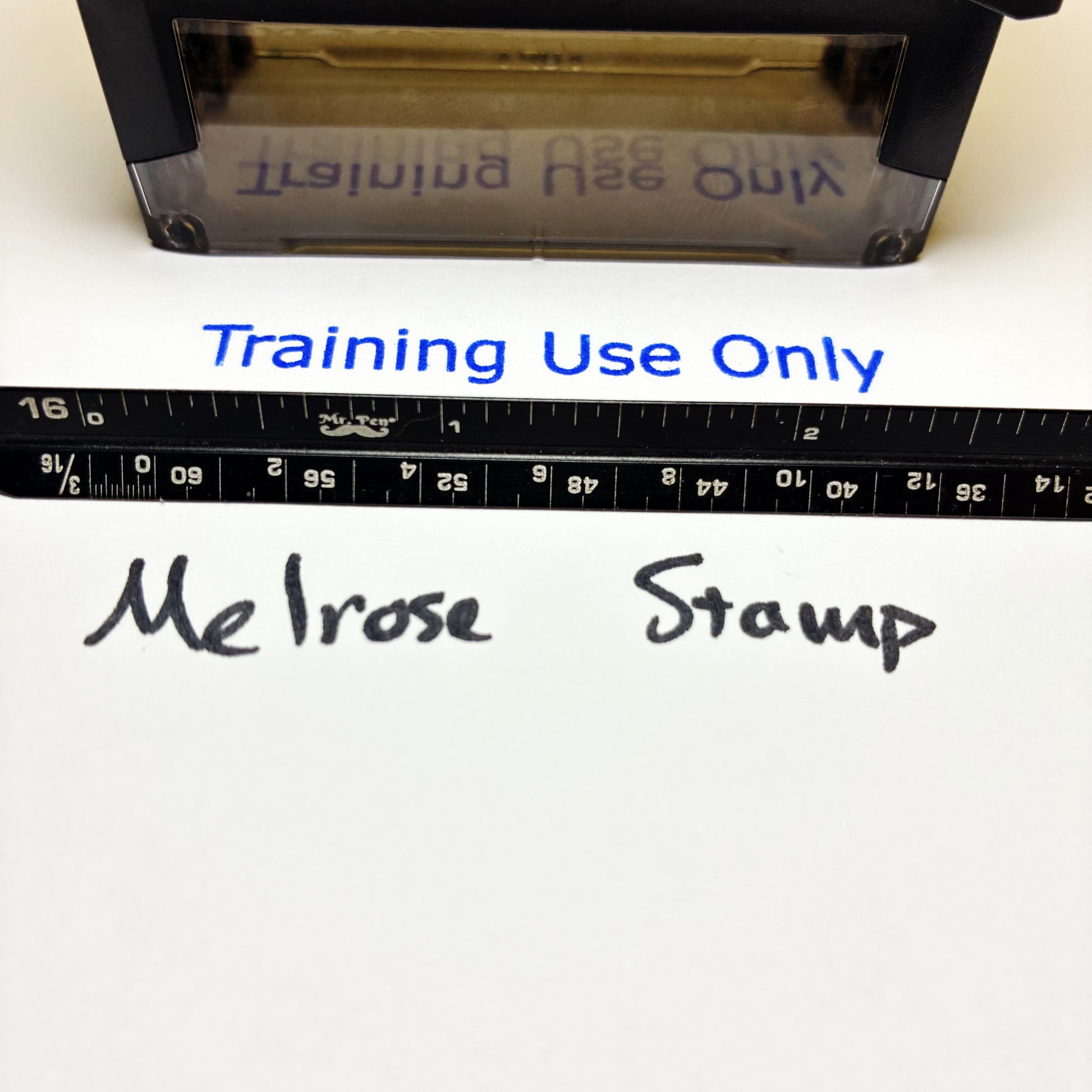 Rubber stamp with 'Training Use Only' text and a ruler below.