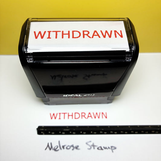 Rubber stamp with 'WITHDRAWN' text on a white background